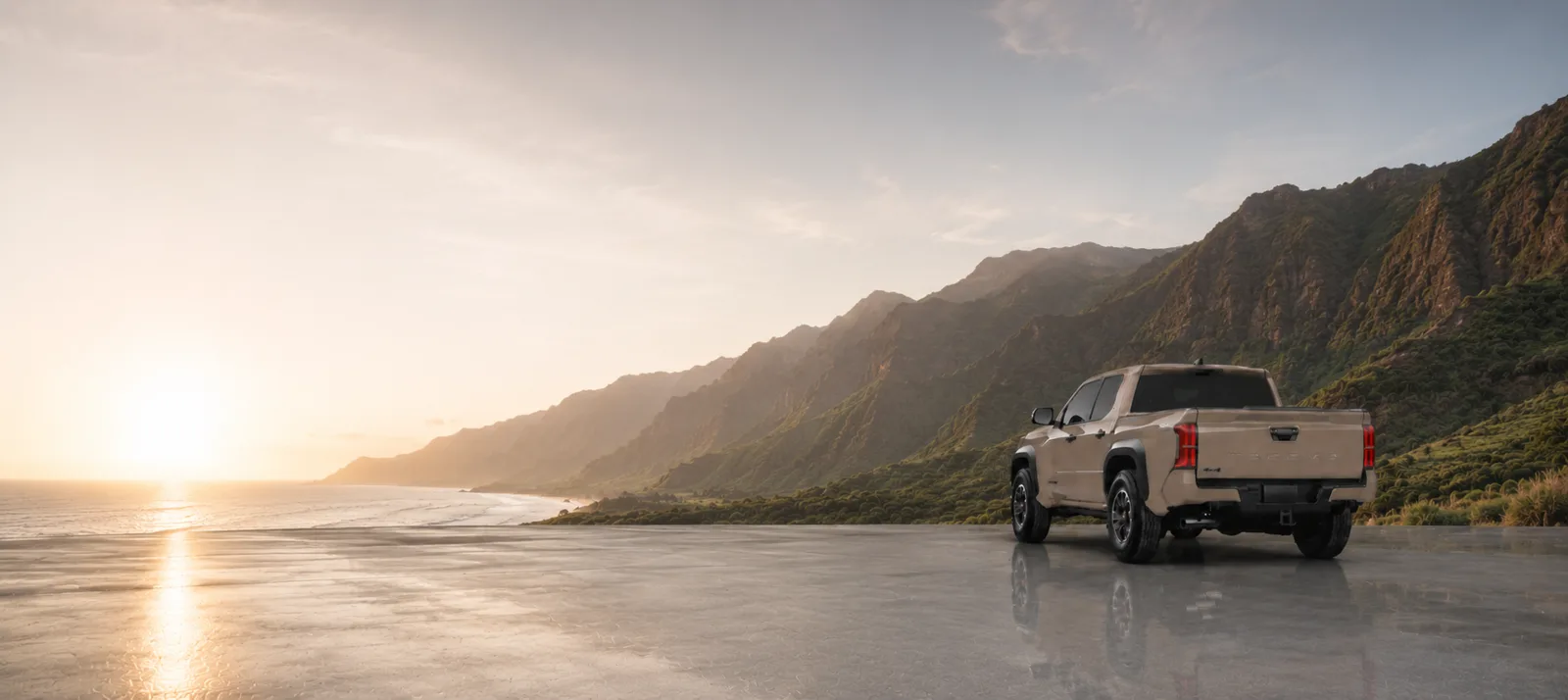 Truck overlooking the Kauai coastline at sunset